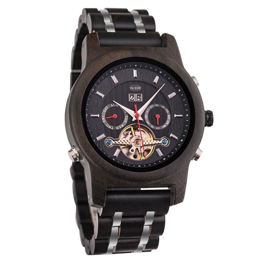 TRÆUR NORDIC – Ebony Midnight men’s mechanical wooden watch with a black ebony wood case, polished stainless-steel accents, and visible mechanical movement. Features chronograph and calendar functions, combining Scandinavian minimalist design with technical sophistication.