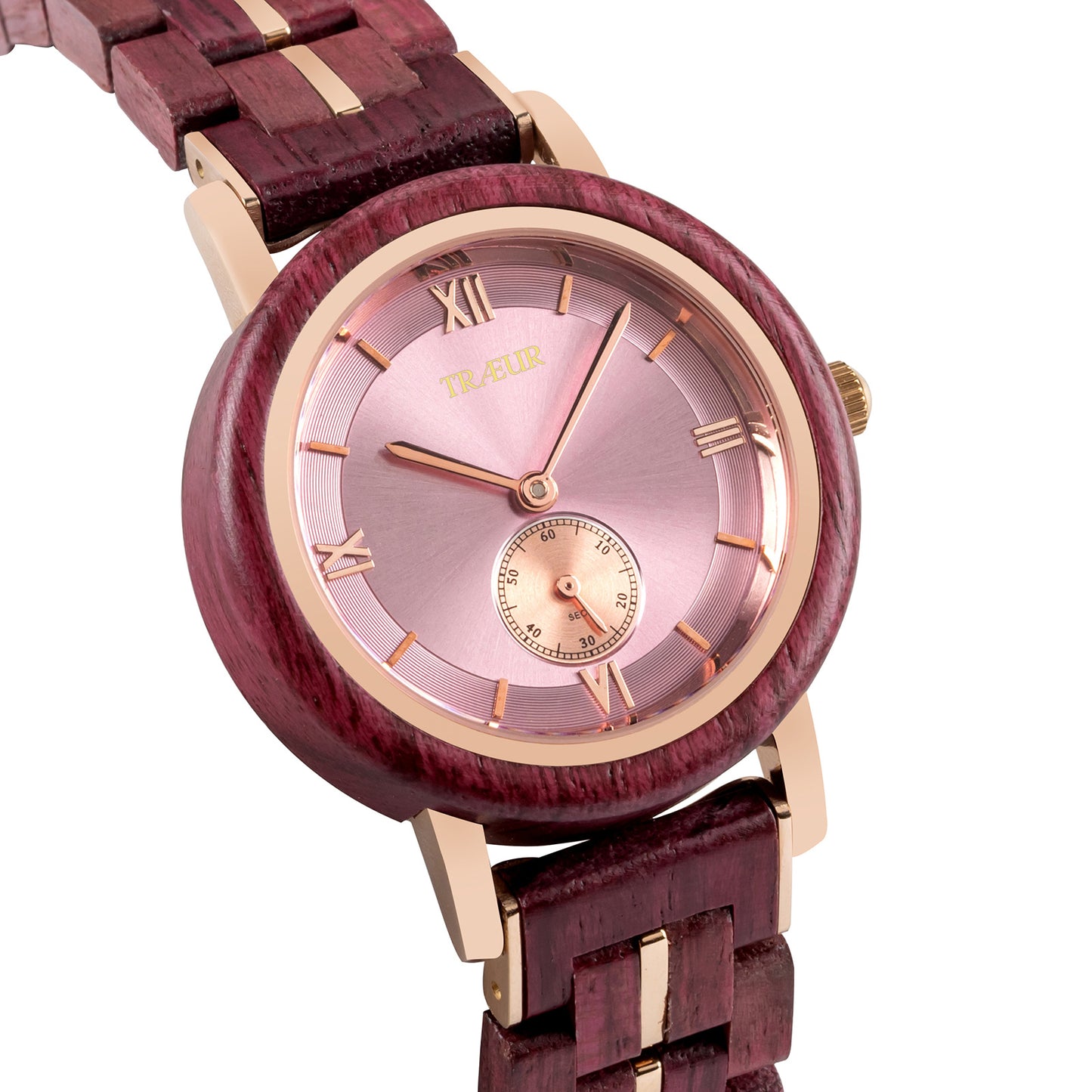 Close-up of luxury wristwatch with purple wood case and band, rose gold accents, and pink dial