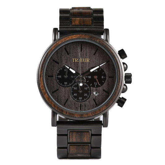 TRÆUR BJERG – Ebony Noir men’s wooden watch with a 44mm black dial, dark metal accents, and handcrafted ebony wood case. Features chronograph and calendar functions, combining Scandinavian minimalism with bold masculine design.