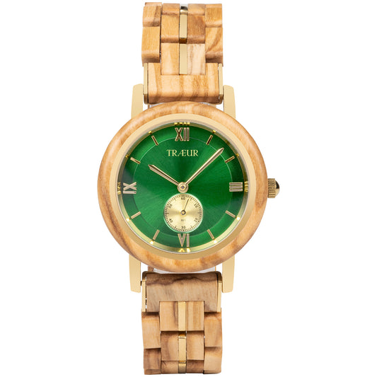 Wooden wristwatch with green dial, gold accents, and Roman numeral markers by TRÆUR